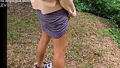 Shemale with ladydick pees in the park casually