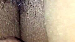 ebony babe plays with wet pussy using vibrator and huge black cock toy.