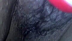 ebony babe plays with wet pussy using vibrator and huge black cock toy.