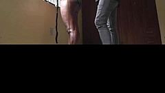 dramatic indoor scene with woman in black leggings