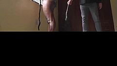 dramatic indoor scene with woman in black leggings