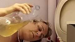 Homemade humiliation: slave bent over with buttplug, spanked and talked dirty to orgasm.