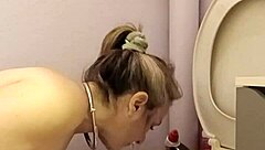 Homemade humiliation: slave bent over with buttplug, spanked and talked dirty to orgasm.