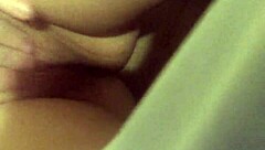 She teases her sexy clit slowly in a solo masturbation session.