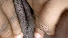 Ebony bbw fingers her big creamy pussy lips until squirting orgasm