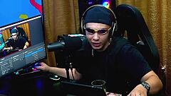 Martina Olivera offers two reais or a mysterious gift in her outdoor public podcast interview. She chats in the shack with teen guests.