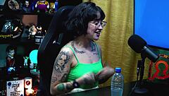 Martina Olivera offers two reais or a mysterious gift in her outdoor public podcast interview. She chats in the shack with teen guests.