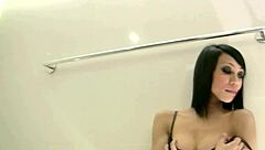 beautiful teen tranny with short hair and lingerie reveals her body in a solo scene