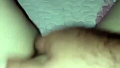 In a homemade video, an amateur pregnant milf experiences a quick slap in an intimate moment.