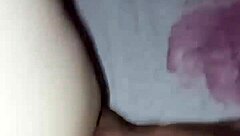 In a homemade video, an amateur pregnant milf experiences a quick slap in an intimate moment.