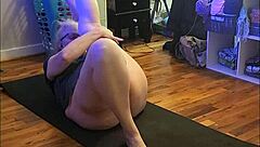 Hot milf stretches in early morning yoga session