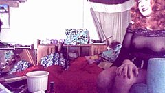 The sexy redheaded tranny named Ms. Head eagerly swallows her own 8-inch vibrating dildo in a solo session. She enjoys the smooth, hairless feel.