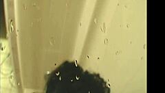 Amateur black ebony from caribbean gives blowjob in the shower during bathing session with theshimmyshow and foxy roxy.