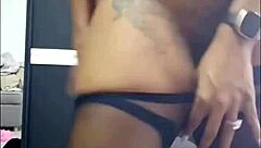 she slips into lingerie and stockings, teasing with her hairy pussy and bare feet before heading out to meet her husband