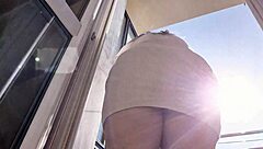 Watch this hot Latina babe flaunt her ass and pussy on the balcony without panties! Can you handle her fetish tease?