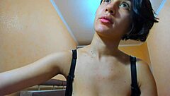 hot brunette in bra plays big natural tits masturbates shaved pussy walks naked