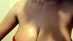 my stepmom showed off her huge milky tits while wearing a red dress