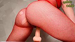 hot milf in sexy red fishnets grabs a big dildo and rides it long and deep for orgasm
