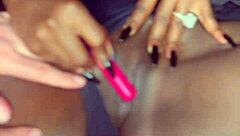 Sexy black model shoves vibrator deep in shaved pussy for white guy watching!