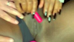 Sexy black model shoves vibrator deep in shaved pussy for white guy watching!