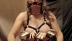 what if an amateur french maid explores bondage with a leather harness and mouth spreader in public