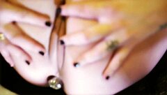 I strip down on the bed showing my big tits and brunette curves with teasing licks