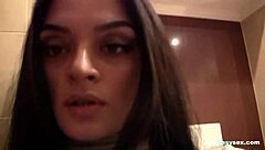 busty babe steps into the bathroom for solo fingering of her hairy bush until orgasm hits