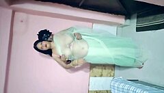 In the in-laws' house, enjoying some lighthearted fun with my sister-in-law.