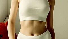 Fancy eastern european lingerie model shows off panties and barefoot style.