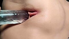 I'm so bored, just fingering my shaved pussy with this cute sex doll for double penetration fun.