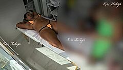 Massaging with Micro Bikini Shoved Deep in Pussy