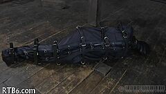 Restrained girl faces punishment in garage setting