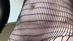 Athletic brunette milf dives into a fetish workout session with fishnets and fitness moves in her European housewife routine
