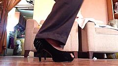 I love strutting in my black high heels as a shemale...