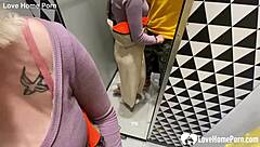 Oh man, my blonde gf with glasses and lipstick gets on her knees for a homemade blowjob in the shop changing booth, sucking my tattooed cock until cumshot! 😏🍆💦