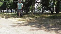 hairy mature woman strolls in a see-through dress, teasing with flashes of her body in public spots