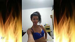 Beautiful brunette poses in blue lingerie for trailer 01