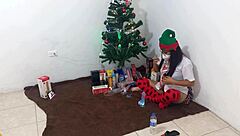This mature student unwraps her Christmas gifts and enjoys masturbating with a dildo under spotlights in her uniform.