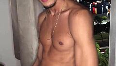 Who knew this naughty boy would jerk off right at the building window for everyone