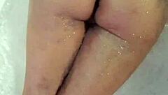 Hey, Christiana's just glittering up her shower and bathtub area, looking all nude and bubbly in the pool solo!