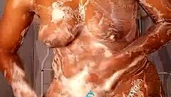 African ebony whore Ruzzyde uses dildo on big ass and boobs in bathroom shower. Pussy gets wet and ready for sexy bathing action.