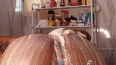 African ebony whore Ruzzyde uses dildo on big ass and boobs in bathroom shower. Pussy gets wet and ready for sexy bathing action.