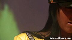 horny brunette stripper starts ripping clothes in a teasing striptease before masturbating wildly on the stage