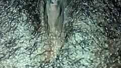 Man, this ebony babe plays with her hairy wet pussy in homemade solo until she orgasms hard.