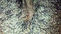 Man, this ebony babe plays with her hairy wet pussy in homemade solo until she orgasms hard.