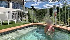 Hey, check out my wife flashing her big tits in the hotel pool during our daring public exhibitionist adventure.