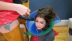 why is this bdsm slut gagging on a strapon in rough domination with choking and bondage?