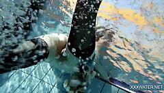 Hey there, check out this hot Hungarian teen 18+ named Petra chilling in the swimming pool with her tight, shaved body on display.