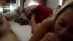 Sara B, with her small tits, leans in close and says, I'm ready to suck you off right now.