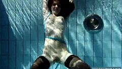 Hey there, check out this hot Hungarian teen 18+ named Petra chilling in the swimming pool with her tight, shaved body on display.